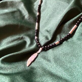 Onyx, Hematite and a Feather necklace